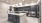 a kitchen with stainless steel appliances and a large island